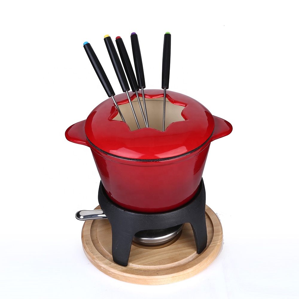 Cute cast iron fondue set with enameled coating and various accessories