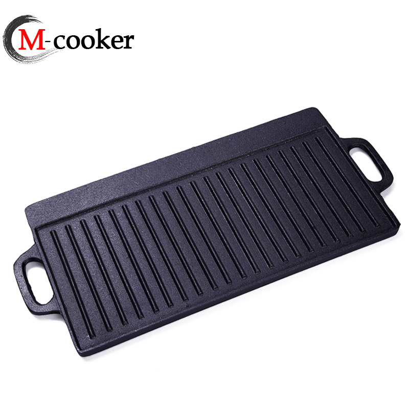 Cast iron griddle with two handles