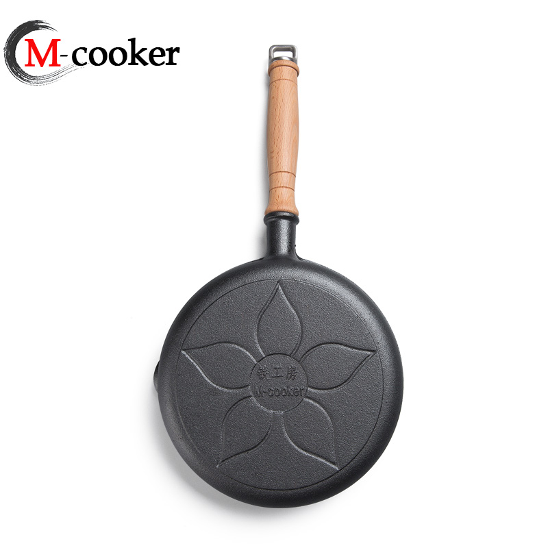 Cast iron fry pan with wooden handle