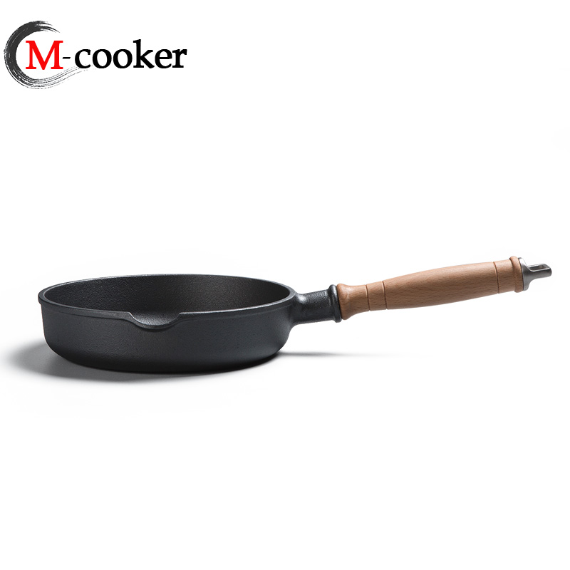 Cast iron fry pan with wooden handle