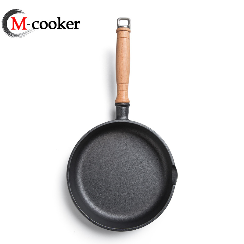 Cast iron fry pan with wooden handle