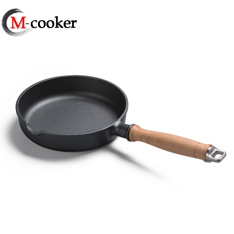 Cast iron fry pan with wooden handle